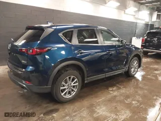 2023 Mazda CX-5 2.5 S Carbon Edition with VIN JM3KFBCM3P0265952, listed as a IAAI auction lot 41541769 with 12,886 mi miles. Bid and sale history available at carsss.com. Image 4.