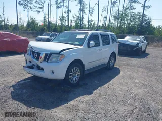 2012 Nissan Pathfinder SV with VIN 5N1AR1NN1CC616194, listed as a IAAI auction lot 40821219 with 104,698 mi miles. Bid and sale history available at carsss.com. Image 2.