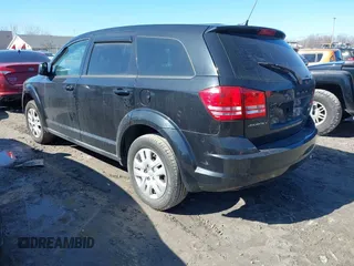 2013 Dodge Journey SE with VIN 3C4PDCAB7DT731506, listed as a IAAI auction lot 41762394 with 215,424 mi miles. Bid and sale history available at carsss.com. Image 3.
