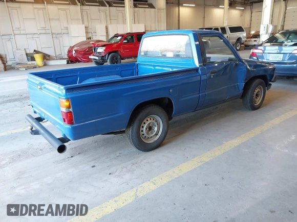 1985 Toyota Pickup z VIN JT4RN50RXF0083921, wystawiony jako IAAI lot #42029838 z przebiegiem 249 994 mil mil oraz . Historia ofert i sprzedaży dostępna na DreamBid. Obrazek 4.
