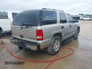 2004 Chevrolet Tahoe Z71 with VIN 1GNEK13T64R160193, listed as a IAAI auction lot 42544720 with 267,764 mi miles and . Bid and sale history available at DreamBid. Image 4.