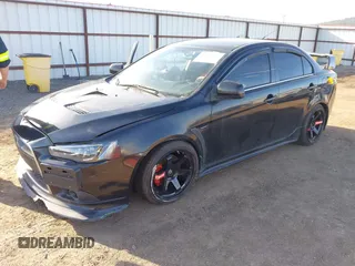 2009 Mitsubishi Lancer with VIN JA3AV66V39U040203, listed as a IAAI auction lot 41884811 with 117,429 mi miles and . Bid and sale history available at DreamBid. Image 2.