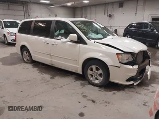 2012 Dodge Grand Caravan SXT with VIN 2C4RDGCG3CR405373, listed as a IAAI auction lot 41264407 with 164,019 mi miles and . Bid and sale history available at DreamBid. Image 1.