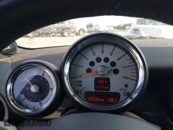 2010 MINI Convertible S with VIN WMWMS3C58ATY09098, listed as a IAAI auction lot 42149773 with 127,424 mi miles and . Bid and sale history available at DreamBid. Image 7.