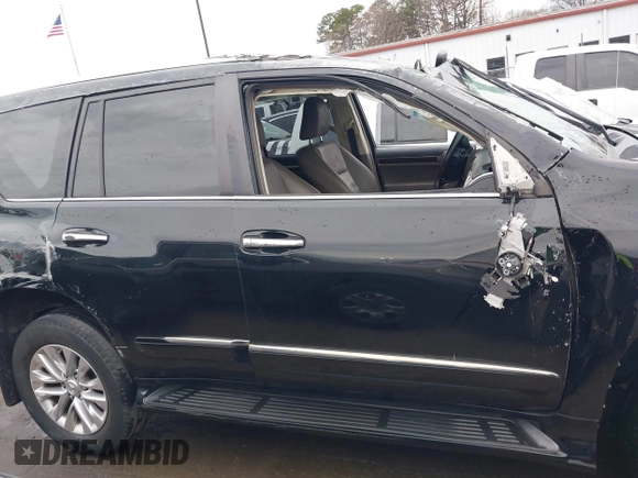 2014 Lexus GX 460 with VIN JTJBM7FX6E5073973, listed as a IAAI auction lot 41610332 with 128,870 mi miles. Bid and sale history available at carsss.com. Image 12.