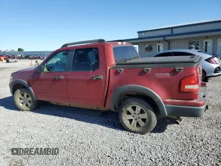 2007 Ford Explorer Sport Trac XLT with VIN 1FMEU51887UA09474, listed as a Copart auction lot 57625115 with 128,443 mi miles and Salvage title. Bid and sale history available at DreamBid. Image 2.