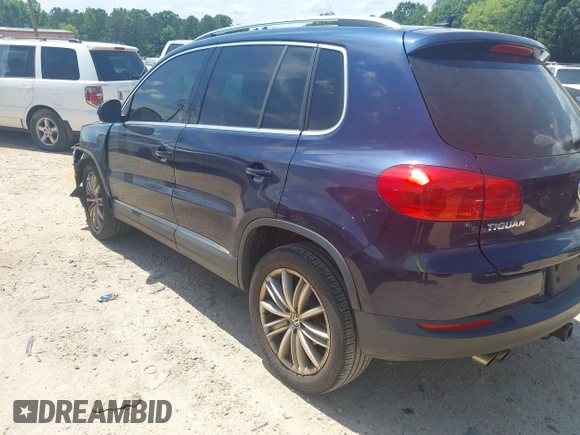 2012 Volkswagen Tiguan SE with VIN WVGAV7AX7CW534703, listed as a IAAI auction lot 42463358 with 119,699 mi miles and . Bid and sale history available at DreamBid. Image 3.