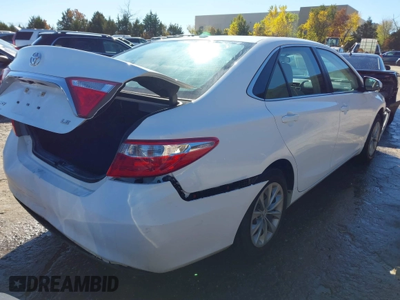 2015 Toyota Camry XLE with VIN 4T1BF1FK7FU023620, listed as a IAAI auction lot 40901262 with 122,968 mi miles. Bid and sale history available at carsss.com. Image 4.