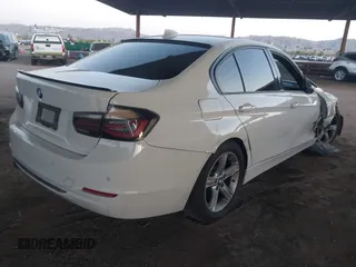 2014 BMW 3 Series 328d with VIN WBA3D3C51EF099116, listed as a IAAI auction lot 42121233 with Not Provided miles and . Bid and sale history available at carsss.com. Image 4.