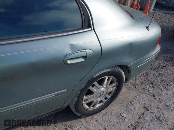 2005 Mercury Sable LS with VIN 1MEFM55S05A606971, listed as a IAAI auction lot 41896757 with 193,536 mi miles and . Bid and sale history available at DreamBid. Image 12.