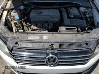 2014 Volkswagen Passat SE z VIN 1VWBT7A34EC061825, wystawiony jako Copart lot #59903665 z przebiegiem 185 542 mil mil oraz Szkoda całkowita • Salvage title. Historia ofert i sprzedaży dostępna na DreamBid. Obrazek 11.