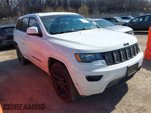 2017 Jeep Grand Cherokee Laredo with VIN 1C4RJFAG9HC824883, listed as a IAAI auction lot 41876117 with 141,067 mi miles. Bid and sale history available at carsss.com. Image 1.