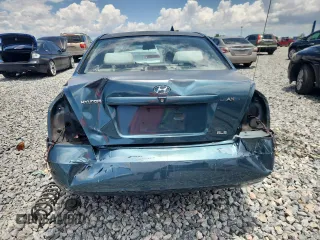 2001 Hyundai Elantra GLS z VIN KMHDN45D61U132398, wystawiony jako Copart lot #61164165 z przebiegiem 162 729 mil mil oraz Szkoda całkowita • Salvage title. Historia ofert i sprzedaży dostępna na DreamBid. Obrazek 6.