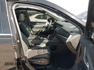 2023 Cadillac XT6 FWD Luxury with VIN 1GYKPAR44PZ114020, listed as a IAAI auction lot 41669115 with 110,305 mi miles. Bid and sale history available at carsss.com. Image 5.
