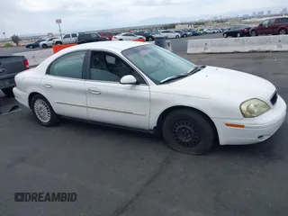 2002 Mercury Sable GS z VIN 1MEFM50U12G628060, wystawiony jako IAAI lot #42072436 z przebiegiem 139 336 mil mil oraz . Historia ofert i sprzedaży dostępna na DreamBid. Obrazek 13.