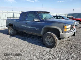 1995 GMC Sierra 1500 z VIN 2GTEK19K3S1591653, wystawiony jako Copart lot #75799124 z przebiegiem 329 311 mil mil oraz Nie do naprawy. Historia ofert i sprzedaży dostępna na DreamBid. Obrazek 4.