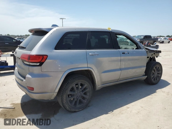2018 Jeep Grand Cherokee Laredo with VIN 1C4RJFAG4JC272683, listed as a Copart auction lot 56823455 with 122,778 mi miles and Salvage title. Bid and sale history available at DreamBid. Image 3.