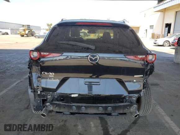 2024 Mazda CX-30 S Select Sport with VIN 3MVDMBBM8RM658675, listed as a Copart auction lot 61963635 with 8,497 mi miles and Salvage title. Bid and sale history available at DreamBid. Image 6.