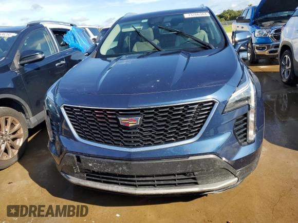 2021 Cadillac XT4 FWD Premium Luxury z VIN 1GYFZCR48MF056210, wystawiony jako Copart lot #73706384 z przebiegiem Nie podano mil oraz Nie do naprawy • Non repairable. Historia ofert i sprzedaży dostępna na DreamBid. Obrazek 5.