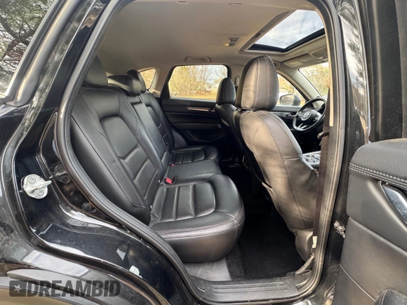2020 Mazda CX-5 Grand Touring with VIN JM3KFADM8L0785373, listed as a Copart auction lot 50829175 with 135,736 mi miles and Clean Title. Bid and sale history available at DreamBid. Image 6.