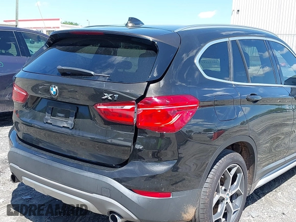 2016 BMW X1 xDrive28i with VIN WBXHT3C3XGP889833, listed as a IAAI auction lot 39118131 with 111,343 mi miles. Bid and sale history available at carsss.com. Image 13.
