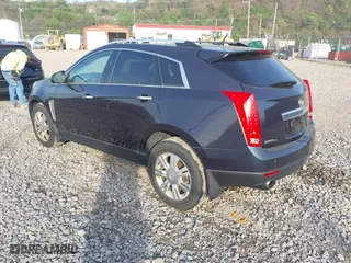 2014 Cadillac SRX Luxury Collection with VIN 3GYFNEE32ES610813, listed as a IAAI auction lot 42098401 with 112,000 mi miles. Bid and sale history available at carsss.com. Image 3.