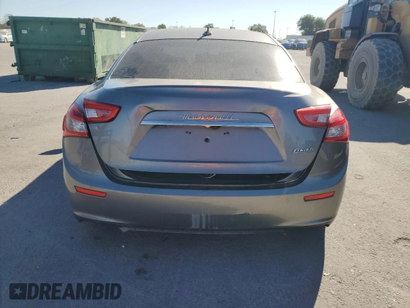2016 Maserati Ghibli z VIN ZAM57XSA3G1167081, wystawiony jako Copart lot #49139785 z przebiegiem Nie podano mil oraz Czysty tytuł • Clean title. Historia ofert i sprzedaży dostępna na DreamBid. Obrazek 6.