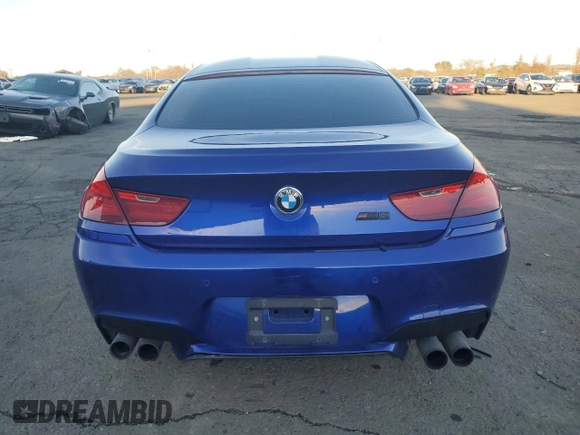 2014 BMW M6 z VIN WBS6C9C5XEDV73722, wystawiony jako Copart lot #87202664 z przebiegiem 68 283 mil mil oraz Szkoda całkowita • Salvage title. Historia ofert i sprzedaży dostępna na DreamBid. Obrazek 6.