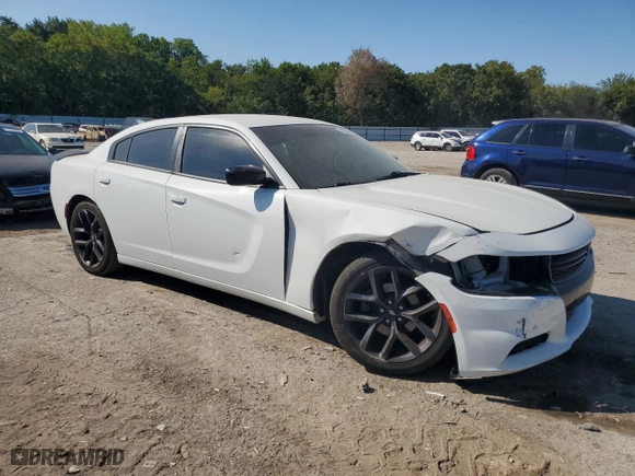 2019 Dodge Charger SXT with VIN 2C3CDXBGXKH745295, listed as a Copart auction lot 71312284 with 107,943 mi miles and Salvage Title. Bid and sale history available at carsss.com. Image 4.
