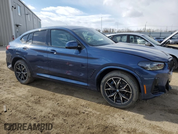 2025 BMW X4 xDrive30i with VIN 5UX33DT05S9Y19798, listed as a Copart auction lot 51861845 with 718 mi miles and Salvage Title. Bid and sale history available at carsss.com. Image 4.