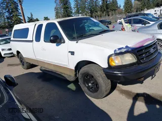 2000 Ford F-150 z VIN 2FTRX17LXYCA29065, wystawiony jako IAAI lot #41676625 z przebiegiem Nie podano mil oraz . Historia ofert i sprzedaży dostępna na DreamBid. Obrazek 1.