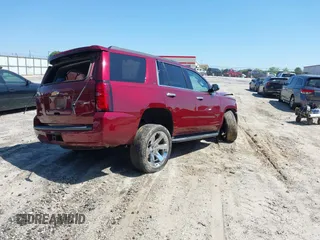 2019 Chevrolet Tahoe LT z VIN 1GNSKBKC2KR338107, wystawiony jako IAAI lot #41999167 z przebiegiem 117 260 mil mil oraz . Historia ofert i sprzedaży dostępna na DreamBid. Obrazek 4.