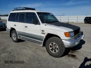 1999 Mitsubishi Montero z VIN JA4MR51R9XJ007139, wystawiony jako Copart lot #41682545 z przebiegiem 200 002 mil mil oraz Czysty tytuł • Clean title. Historia ofert i sprzedaży dostępna na DreamBid. Obrazek 4.