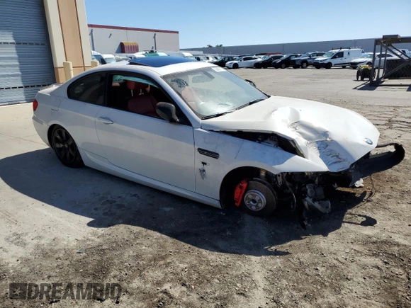 2012 BMW 3 Series 335is with VIN WBAKG1C50CJ217108, listed as a Copart auction lot 56609175 with 105,899 mi miles and Salvage title. Bid and sale history available at DreamBid. Image 4.