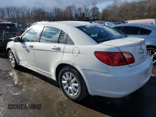 2010 Chrysler Sebring Touring with VIN 1C3CC4FB3AN123448, listed as a Copart auction lot 82329464 with 0 mi miles and Salvage Title. Bid and sale history available at carsss.com. Image 2.