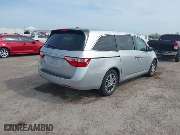 2013 Honda Odyssey EX-L with VIN 5FNRL5H69DB022042, listed as a IAAI auction lot 41902796 with 178,198 mi miles and . Bid and sale history available at carsss.com. Image 4.