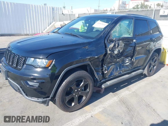 2018 Jeep Grand Cherokee Laredo E with VIN 1C4RJFAG4JC367924, listed as a IAAI auction lot 42065114 with 65,250 mi miles. Bid and sale history available at carsss.com. Image 2.