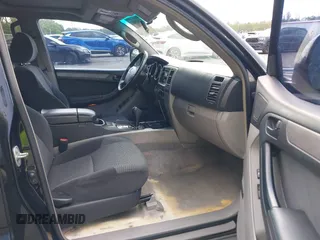 2003 Toyota 4Runner SR5 z VIN JTEZU14RX30007340, wystawiony jako IAAI lot #42361002 z przebiegiem 168 457 mil mil oraz . Historia ofert i sprzedaży dostępna na DreamBid. Obrazek 5.