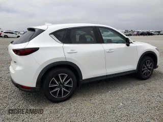 2018 Mazda CX-5 Grand Touring with VIN JM3KFADMXJ1358221, listed as a Copart auction lot 59746545 with 54,094 mi miles and Salvage title. Bid and sale history available at DreamBid. Image 3.