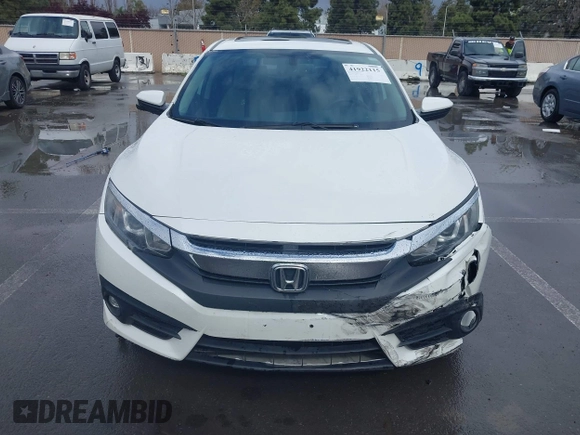 2017 Honda Civic EX-L z VIN 2HGFC1F79HH635156, wystawiony jako IAAI lot #41922115 z przebiegiem 142 565 mil mil oraz . Historia ofert i sprzedaży dostępna na DreamBid. Obrazek 12.