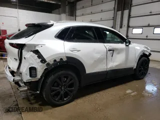 2023 Mazda CX-30 Premium Plus with VIN 3MVDMBEY3PM587798, listed as a Copart auction lot 86524444 with 9,860 mi miles and Salvage title. Bid and sale history available at DreamBid. Image 3.