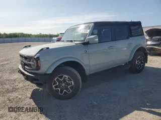 2023 Ford Bronco with VIN 1FMEE5BP0PLC06549, listed as a Copart auction lot 58703305 with 28,051 mi miles and Salvage title. Bid and sale history available at DreamBid. Image 1.
