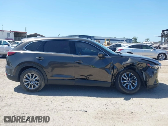 2019 Mazda CX-9 Touring with VIN JM3TCACY9K0304899, listed as a IAAI auction lot 42167180 with 57,043 mi miles and . Bid and sale history available at DreamBid. Image 13.