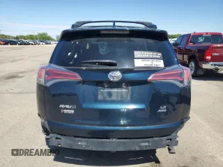 2017 Toyota RAV4 LE with VIN JTMBFREVXHJ700923, listed as a Copart auction lot 52887645 with 119,528 mi miles and Salvage title. Bid and sale history available at DreamBid. Image 6.