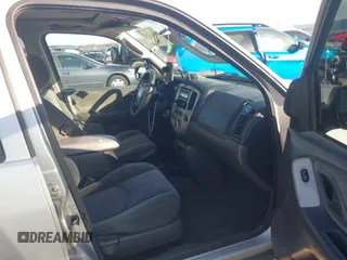 2003 Mazda Tribute LX with VIN 4F2YZ04183KM44733, listed as a IAAI auction lot 41472662 with 246,522 mi miles and . Bid and sale history available at DreamBid. Image 5.