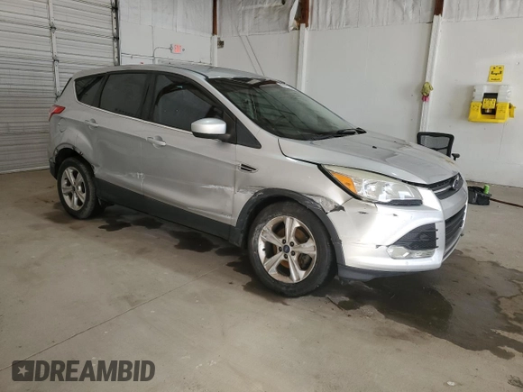 2013 Ford Escape SE with VIN 1FMCU0GX3DUD66890, listed as a Copart auction lot 86477264 with 142,722 mi miles and Salvage Title. Bid and sale history available at DreamBid. Image 4.
