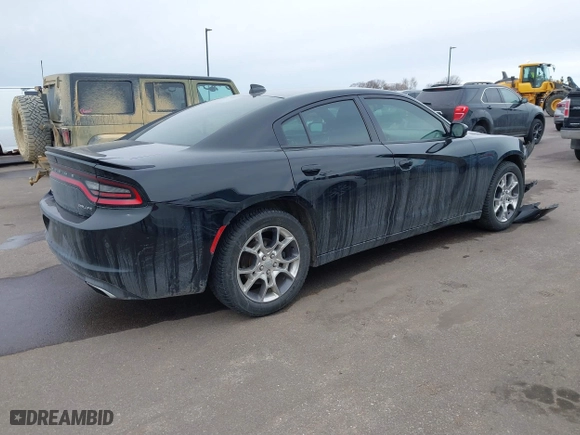 2016 Dodge Charger SXT with VIN 2C3CDXJG9GH303942, listed as a IAAI auction lot 41618893 with 116,630 mi miles. Bid and sale history available at carsss.com. Image 4.