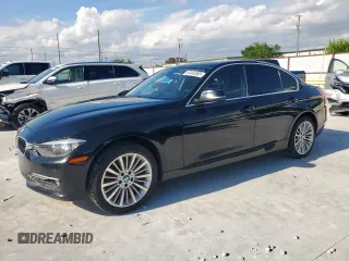 2013 BMW 3 Series 328i xDrive with VIN WBA3B3C51DF537167, listed as a Copart auction lot 60453385 with 122,003 mi miles and Salvage title. Bid and sale history available at DreamBid. Image 1.