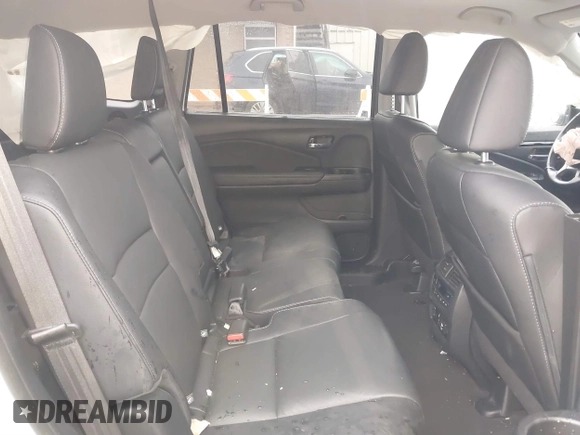 2021 Honda Pilot Touring 8-Passenger z VIN 5FNYF6H90MB031795, wystawiony jako IAAI lot #41207263 z przebiegiem 56 367 mil mil oraz . Historia ofert i sprzedaży dostępna na DreamBid. Obrazek 8.