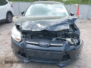 2014 Ford Focus SE z VIN 1FADP3K20EL173638, wystawiony jako IAAI lot #42265687 z przebiegiem 41 792 mil mil oraz . Historia ofert i sprzedaży dostępna na DreamBid. Obrazek 12.
